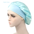 Detail view of the light blue silk satin sleep cap with a wide elastic headband on a model - Adjustable / Light Blue