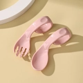 Pink baby training fork and spoon set with curved handles for self-feeding practice - Sakura Pink (Bagged)
