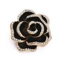 Detail shot of vintage black rose brooch with gold plating and sparkling crystal edges - Large Rhinestone KC Gold