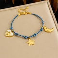 Bohemian woven cord bracelet with gold sun moon and heart star charms in blue and gold - Blue Gold Woven Sun Moon Star Heart Bracelet (B1723)