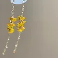 Macro detail of yellow floral bead earrings with long tassels and crystal accents - 31# Ear Hook - Gold - Yellow Flower
