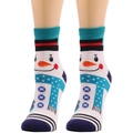 Close-up of white and blue Christmas socks with snowman pattern worn by a model - One Size / Snowman / Blue