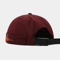 Rear view of wine red docker hat showing adjustable nylon strap and plastic buckle closure - Burgundy