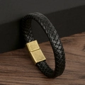Detailed macro view of black braided leather bracelet with bronze magnetic clasp - Black