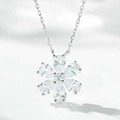 Detailed macro shot of a flower-shaped silver pendant with clear pear-cut stones - White Daisy Clavicle Necklace