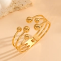 Brazalete moderno de acero inoxidable dorado de tres capas con cuentas para mujer - Brazalete Hueco de Tres Capas con Seis Bolas de Acero (R810)
