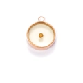 Rose gold round resin pendant with mustard seed interior on clear white background - Rose Gold