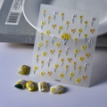 Detailed view of 3D embossed floral nail art stickers with yellow daffodil patterns. - Narcissus Butterfly Bow (TS-075)