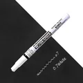 White Sakura Pen-touch 0.7mm extra fine point paint pen on black and white surface - 0.7mm / White
