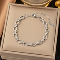 Polished silver stainless steel chain bracelet with lobster clasp in a jewelry box - Round Curb Chain Bracelet / Steel