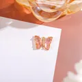 Pink gradient crystal butterfly pendant with gold metal edges and zircon accents - Rose Red