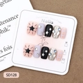 Faux ongles faits main style doux et cool avec étoiles, motifs à carreaux et cristaux - XS (SD128)