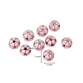Macro shot of 11.5mm white soccer style acrylic beads with red engraved patterns - White Red Pattern Soccer