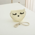 Détail du sac bandoulière en paille crème avec broderie visage et bandoulière corde - 2-6 Ans / Sac / Crème