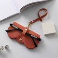 Funda de gafas naranja en cuero PU granulado con cordón portátil y cierre metálico - Naranja