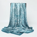Detailed view of teal paisley satin scarf with elegant silver-white floral pattern - Cyan Base Silver White Paisley (FT264-3)