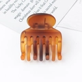 Brown matte semi-circle hair claw clip with a minimalist design for ponytails - PC Material / Matte Amber
