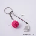Mini silver metal golf club and pink ball keychain pendant with dimensions 7.8cm and 2cm - Pink Golf Ball + Club
