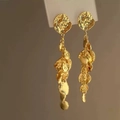 Macro shot of gold-plated metal drop earrings with irregular hammered texture on layered petals - Gold (6# Silver Needle)