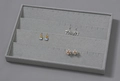 Grey velvet jewelry display tray with tiered slots for earrings and stud storage - Grey Ice Velvet Earring Tray