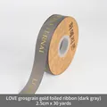 Dark grey 2.5cm ribbed ribbon with gold LOVE IS ETERNAL lettering for gift wrapping - 2.5cm Wide x 30 Yards Long / Dark Gray