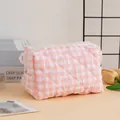 Floral quilted makeup bag in pink white checkered fabric with secure zipper closure - Grid Pink