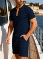Completo uomo in maglia blu navy con polo e pantaloncini e colletto arancione a contrasto - S / Blu navy