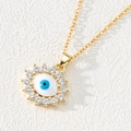 Gold Evil Eye necklace with blue zircon stones in a Bohemian pendant style - Style E-Gold Rim Zirconia Eye