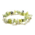 Detailed macro shot of irregular natural green and white crystal stone beads bracelet - Green