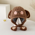 Detail of warm brown knit hat for kids showing soft plush lining and cute ear flaps - 3-8 Years / Brown