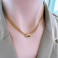 Collier œil protecteur doré avec cristal bleu foncé sur une chaîne en maille tissée - X1219 Collier Œil Bleu Or