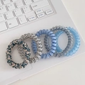 Five-piece blue set of elastic spiral hair ties displayed on a laptop keyboard - 4# Blue Spiral (5pcs Set)
