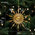 Golden Christmas snowflake ornament hanging on tree with 14.6cm diameter and shiny finish - Sun Style