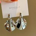 Polished silver abstract fan-shaped geometric earrings on branded display card - Silver Matte Leaf Dangle Earrings