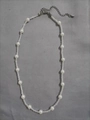 Elegant beaded necklace with white pearls and clear seed beads in a minimalist style - Pearl and Transparent Bead Patchwork Style