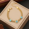 Gold mesh bracelet with turquoise stones and Roman numeral charm on beige jewelry box - Roman Numeral Turquoise Style (4#)