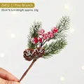 Artificial cedar branch with red berries and faux snow measuring 20cm by 8.5cm - (0432-1) Pine Branch