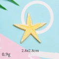 Detail view of a yellow starfish resin accessory measuring 2.8x2.8cm and weighing 0.9g - Yellow Thin Sea Star
