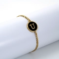 Gold stainless steel bracelet with a black enamel round pendant featuring the letter U - Letter U / Gold/Black