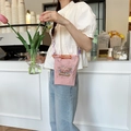 Detailed embroidery of a colorful carousel on a pink oxford cloth mini crossbody bag - Pink Mini with Pink-Purple Braided Rope