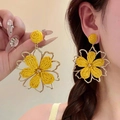 Detailed view of yellow woven raffia flower earrings with elegant gold metal outlines - 15# Yellow Woven Flower (Silver Pin)