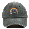 Close-up of rainbow heart embroidery and BE YOU text on washed cotton baseball cap - One Size / Army Green