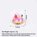 Miniature pink berry cream cake model with rose topper and gold base for display - Rose Red Cream + Pink Rose