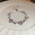 Detail view of pink heart-shaped crystal bracelet with adjustable silver sliding clasp - Pink Heart Main Stone Style (24#)