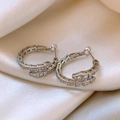 Silver snake-shaped earrings with inlaid crystals on elegant cream silk fabric background - 39# Silver Earring Post - Silver