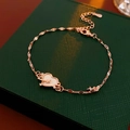 Bracelet coeur en or rose avec nacre blanche et breloques étoiles sur boîte verte - Style Cœur en Nacre Or Rose (20# Bracelet - Or Rose)
