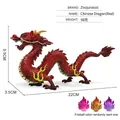 Detailed solid red Chinese dragon figurine with scale textures and yellow flame accents - Red