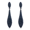 Macro shot of blue crystal teardrop earrings with dark metal base and luxury pavé setting - Sapphire Blue