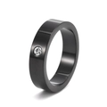 Detail of 5mm black stainless steel ring with a single small inlaid clear gemstone - US 5 / Black