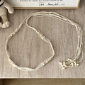 Detail of bohemian cream woven cotton belt with light wood beads on stone background - Multi-Layer Woven Wood Bead 4-Section White